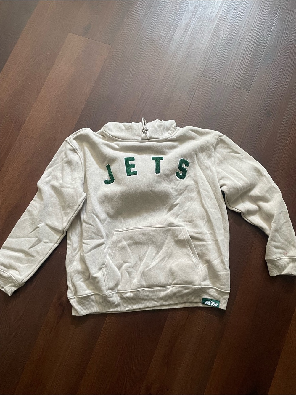 Cream "JETS" football Pullover Hoodie with Green Lettering